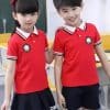 Đồng Phục Mầm Non Màu Đỏ Phối Quần Váy Màu Xanh Đen – MN224