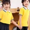 Đồng Phục Mầm Non Màu Vàng Phối Quần Váy Màu Xanh Đen – MN222