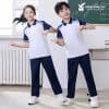 Đồng Phục Thể Dục Trường Học Tiểu Học Màu Trắng Phối Quần Màu Xanh Than- TDTH028 - Ảnh 2