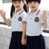 Đồng Phục Mầm Non Màu Trắng Phối Quần Váy Màu Xanh Than - MN309